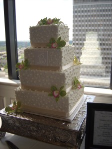 Tracy Defantes wedding cake featuring gumpaste cattleya orchids